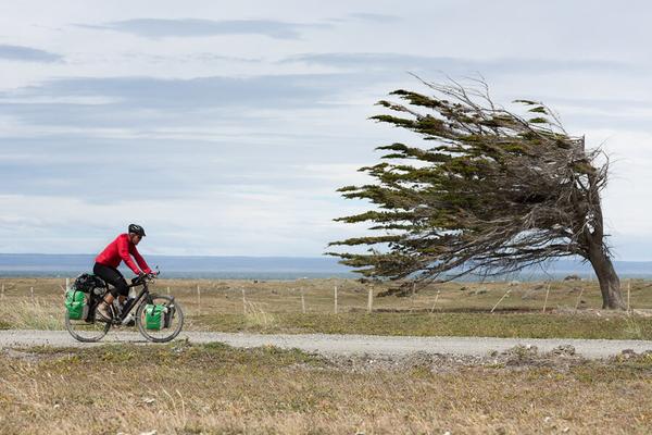 cyclist riding into a headwind
